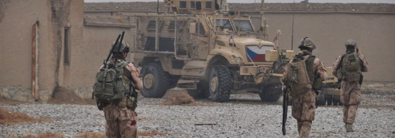 Members of the Czech Armed Forces during an overseas deployment in Afghanistan, serving alongside allied forces.