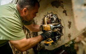 Field repair of tracked military equipment during training ensures continued mobility and operational readiness